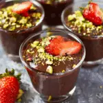 Chocolate Pudding with Pistachios and Strawberries