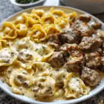 Cheesy Cajun Beef Tortellini Smothered in Creamy Garlic Alfredo