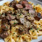 Cajun Steak Tips in Cheesy Bowtie Pasta Parmesan Sauce
