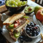 Small Sandwich and Bowl of Fruit