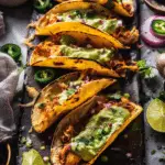 Crockpot Crispy Chicken Tinga Tacos with Jalapeño Avocado Crema